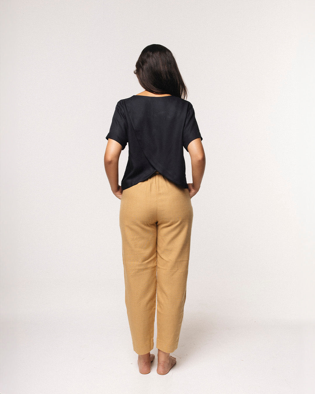 calça fertilità bege