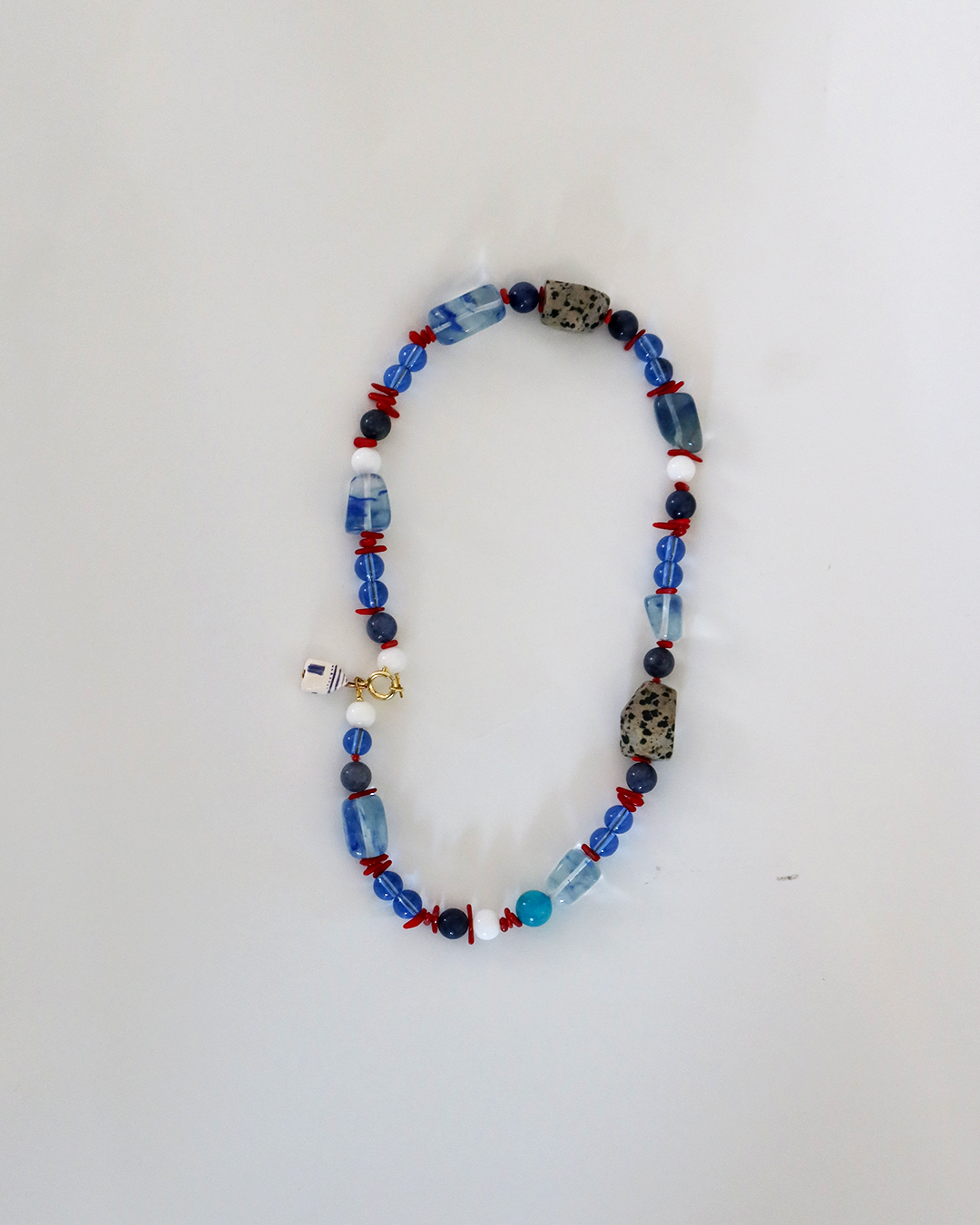 colar cerâmica azul